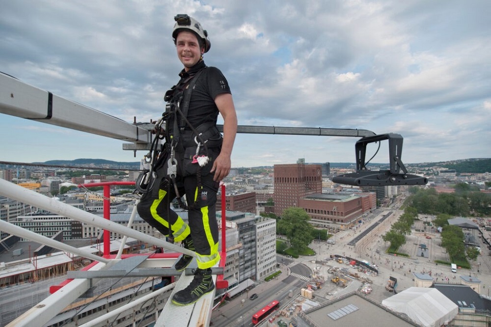 A person with height safety equipment up high