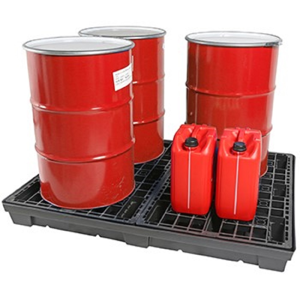 A group of red chemical barrels on a black pallet